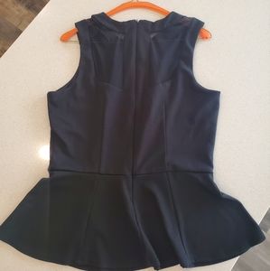 Mossimo peplum top with sheer detail. Size M